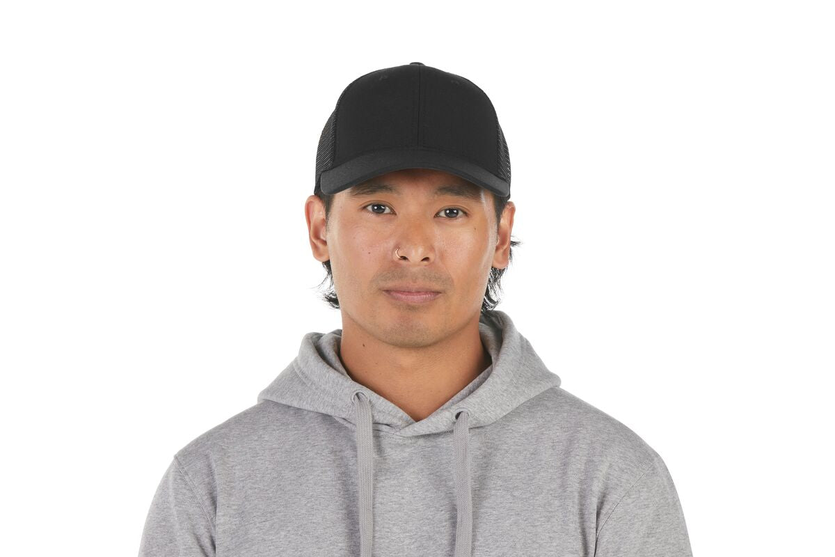 recycled-poly-low-profile-trucker-hat-l1 WebPDP-HAT002002_Recycled_Poly_Low_Profile_Trucker_Hat_Black_Studio_Harper_Studios_0723_Front__HAT002002OS.jpg