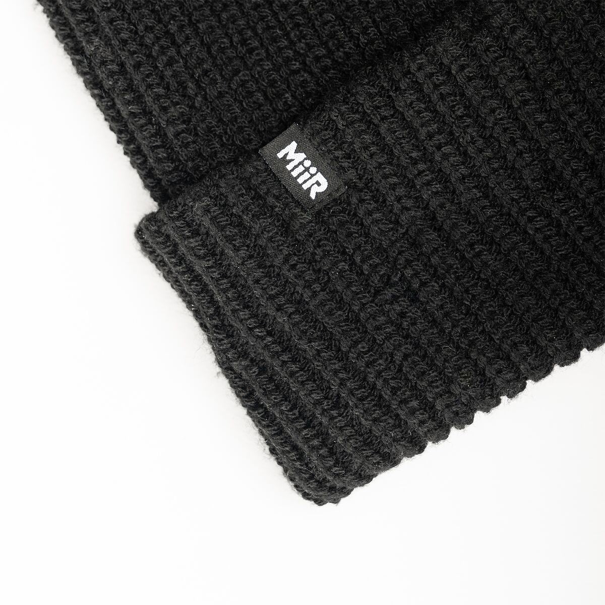recycled-poly-rib-beanie-y2 WebPDP-RecycledPolyRibBeanie_Studio_TagDetail_Black__BNE002002OS.jpg