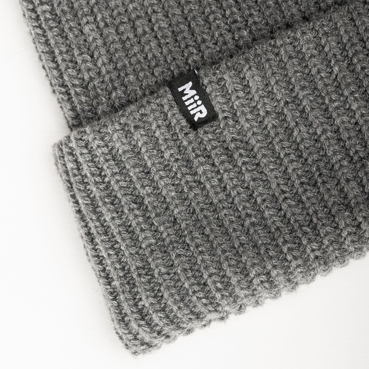 jodie-williams-beanie-q3 WebPDP-RecycledPolyRibBeanie_Studio_TagDetail_GrayHeather__BNE002400OS.jpg